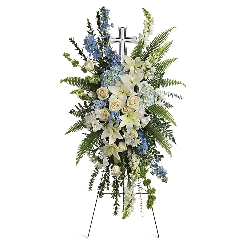 Eternal Grace funeral spray from Teleflora with white and blue flowers