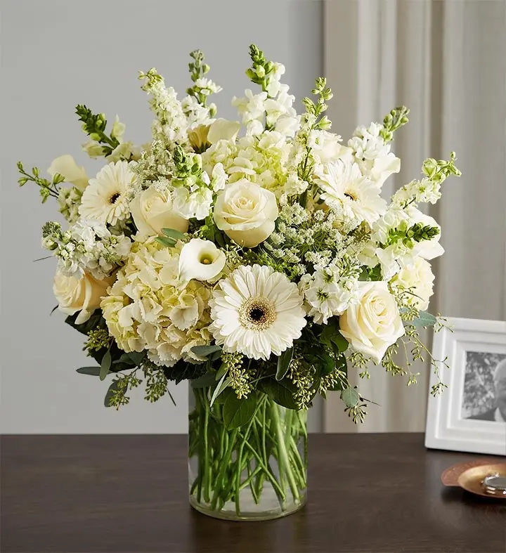 Comforting Thoughts all-white sympathy bouquet from 1-800-Flowers