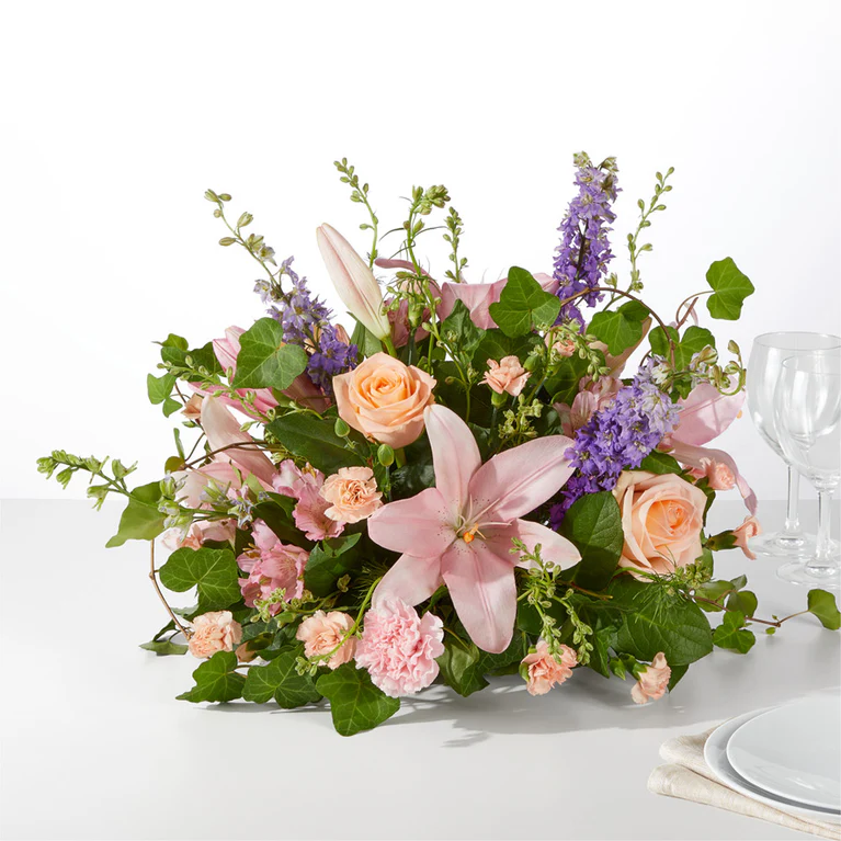 Representative pastel Easter centerpiece from FTD