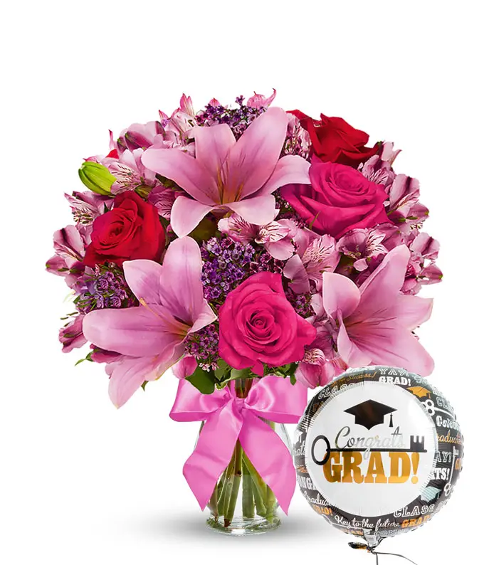Representative red and pink graduation bouquet from From You Flowers